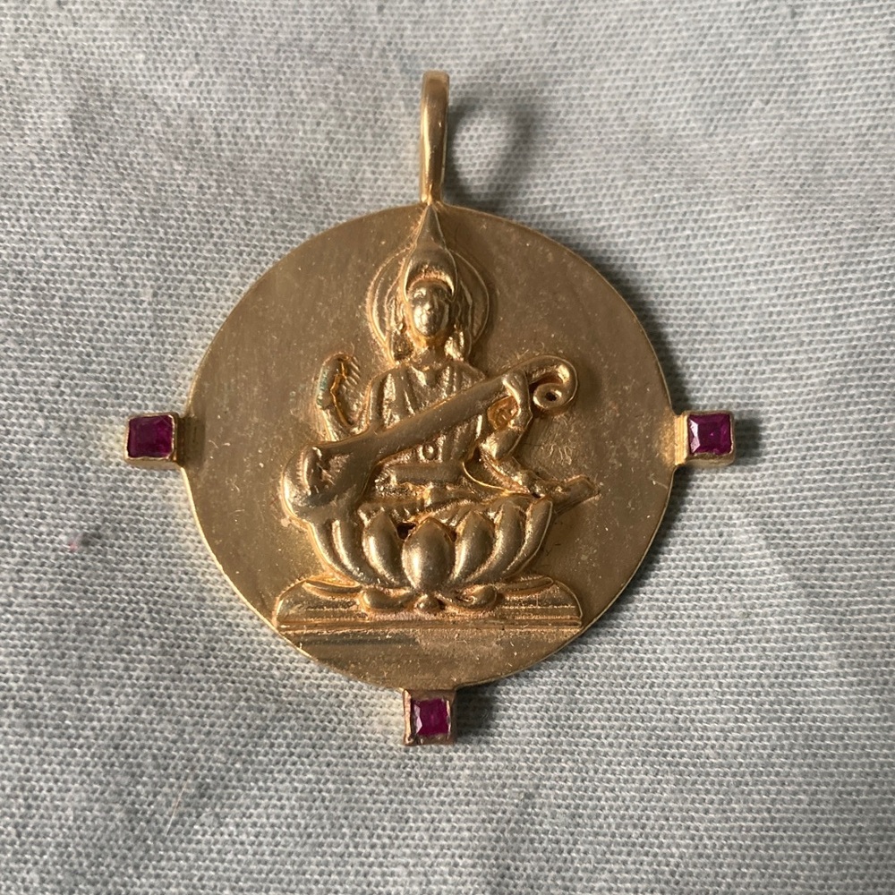 Olio Stories Gold plated Saraswati Pendant with Ruby Accents